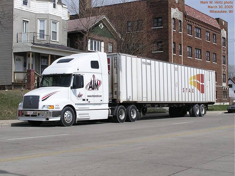 AIM Transfer tractor with STAX container