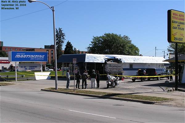 dump truck crashed into One Hour Martinizing