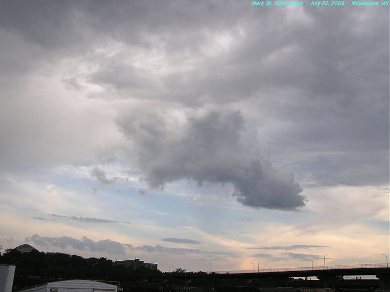 cloudy, rainy, and clear skies over Milwaukee