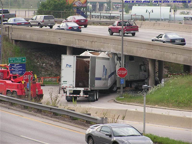 truck stuck under I-94 at Mitchell Blvd.