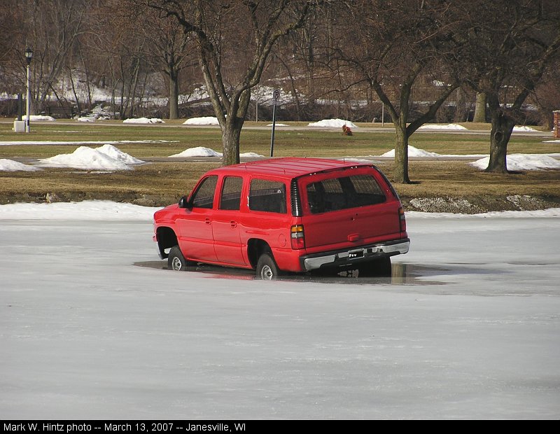 Suburban sinking into the ice in Janesville, WI