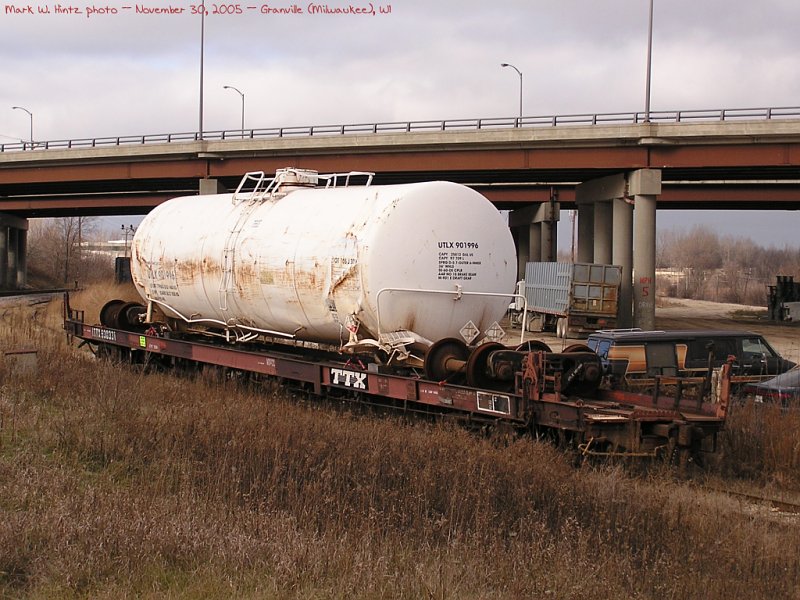 ITTX flatcar 930331 loaded with UTLX tank car 901996