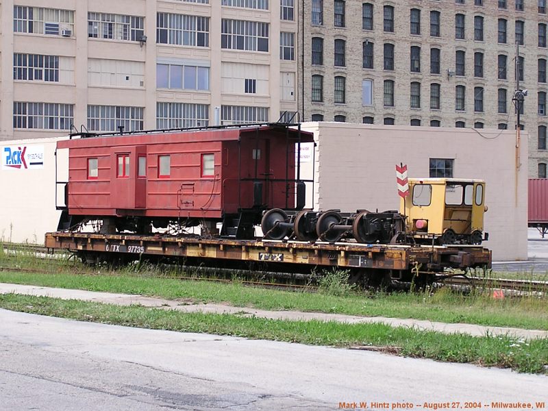 OTTX flatcar 97735 loaded with railroad displays