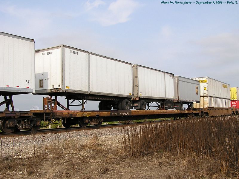 RTTX flat car 972423 with UPS trailers