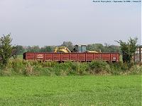 ATSF corrugated-side gondola 74537 with a Caterpillar backhoe