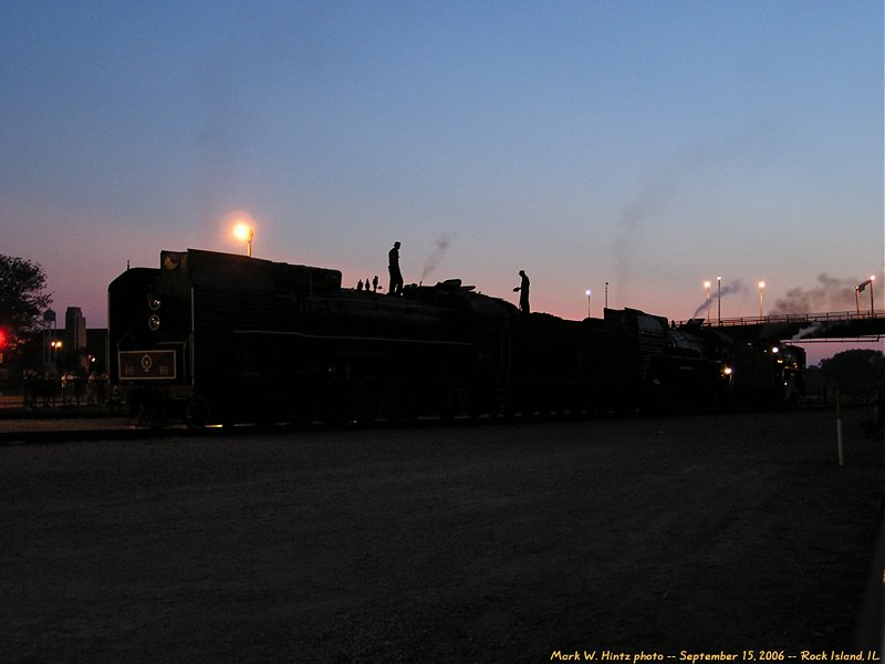 steam engine triple-header at twilight