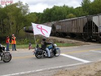 Ride the Ribbon waits for the train to pass