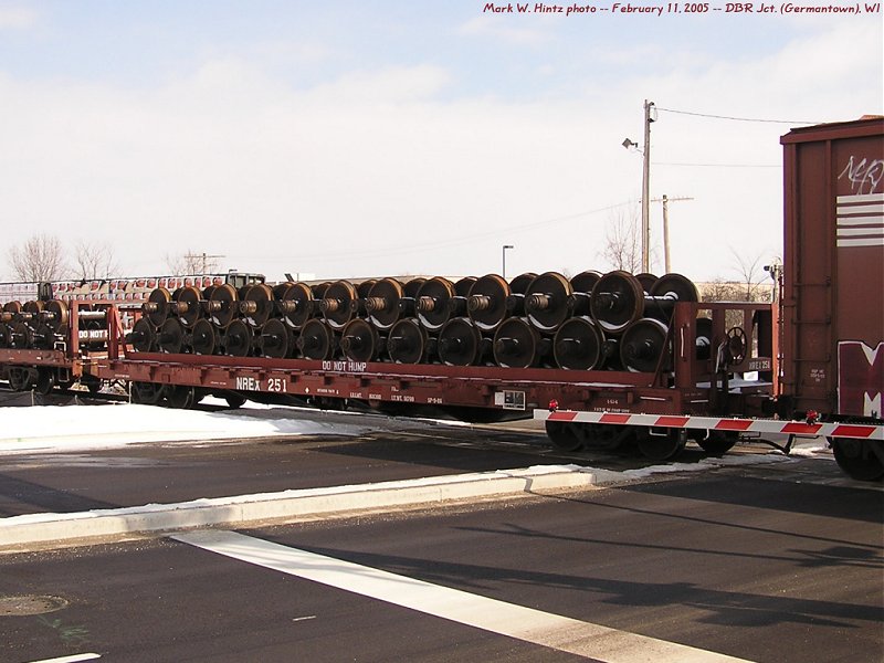 NREX flatcar 251 loaded with wheels