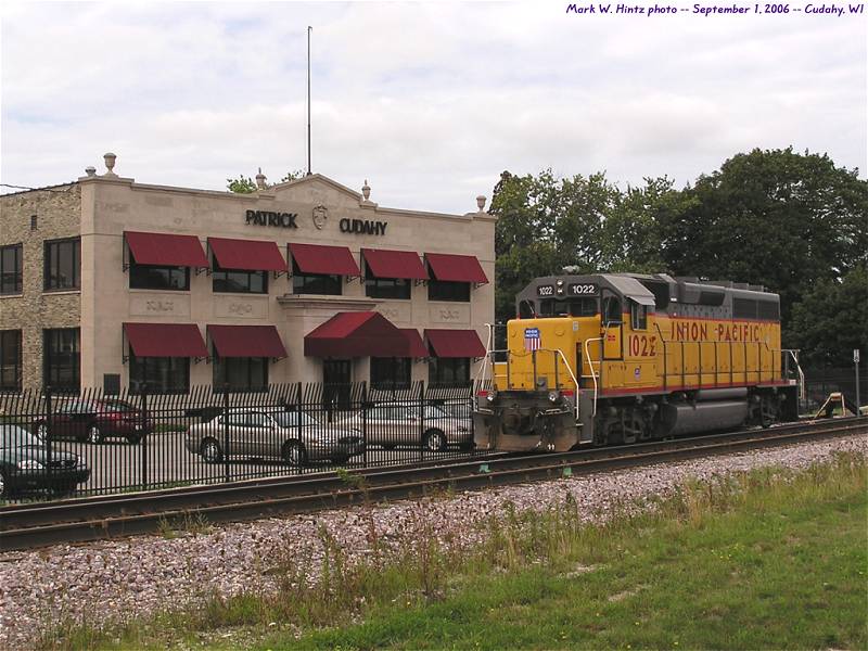 UP EMD GP38-2 1022 in front of the Patrick Cudahy building