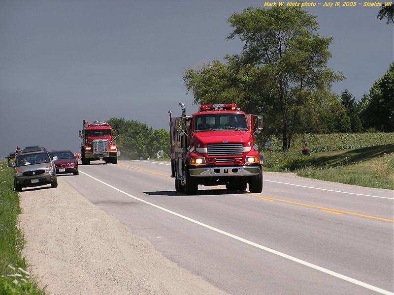 fire trucks on WIS-19 fighting the Watertown Tire Fire