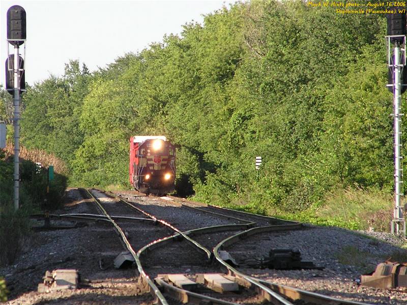 WC 6497 with a short train waiting on Duplainville siding