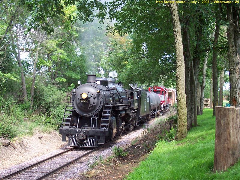 SOO #1003 rolls past the back yard