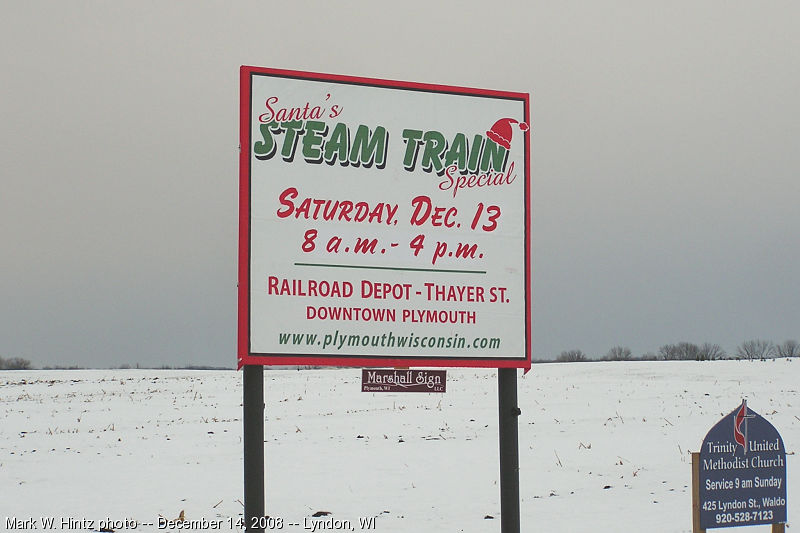 "Santa's Steam Train Special" sign