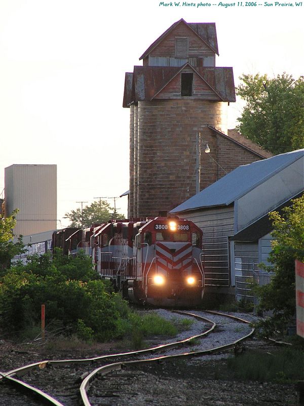 WSOR 3808 and the MABLT posing with the grain elevator at Sun Prairie