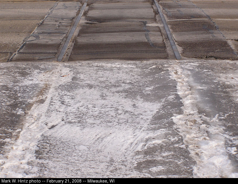 ice buildup on Oklahoma Avenue crossing